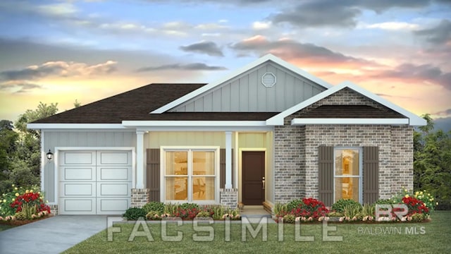13710 Logan Pl, Foley, AL 36535 - view of front of home with board and batten siding, a lawn, an attached garage, and driveway