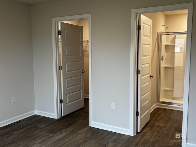 13710 Logan Pl, Foley, AL 36535 - unfurnished bedroom featuring dark wood-type flooring and baseboards