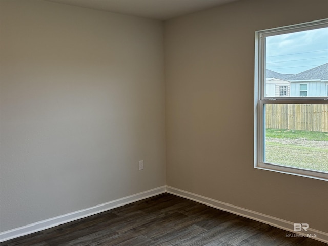 13710 Logan Pl, Foley, AL 36535 - unfurnished room featuring dark wood-style floors and baseboards