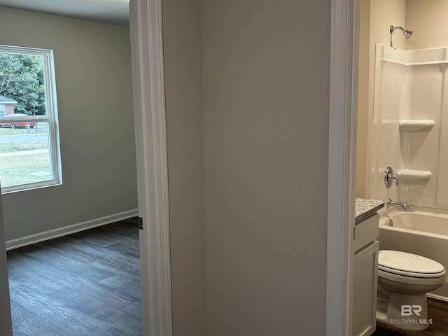 13710 Logan Pl, Foley, AL 36535 - full bathroom with wood finished floors, toilet, shower / bathtub combination, and vanity