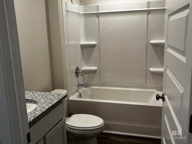 13710 Logan Pl, Foley, AL 36535 - bathroom with toilet, vanity, shower / bath combination, wood finished floors, and a textured wall