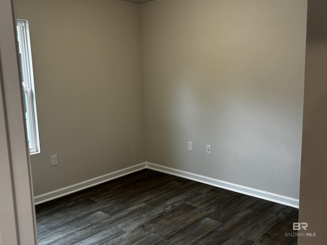 13710 Logan Pl, Foley, AL 36535 - spare room with dark wood-style flooring and baseboards
