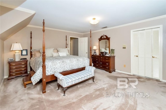 bedroom with a closet, crown molding, and light colored carpet