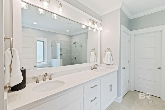 bathroom with a shower with door, crown molding, tile patterned flooring, and dual bowl vanity