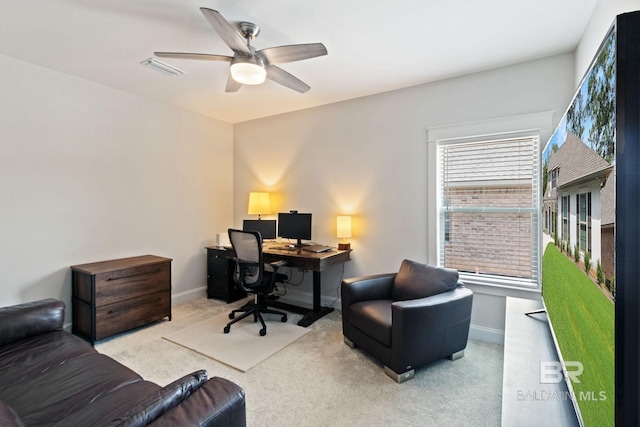 office featuring carpet floors and ceiling fan