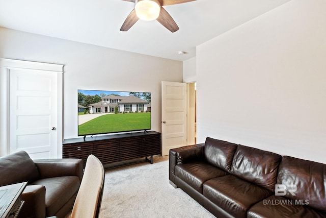 living room featuring light carpet and ceiling fan