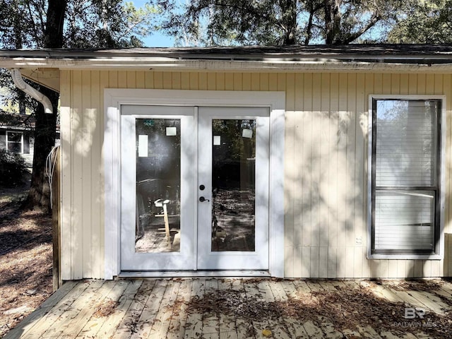 view of exterior entry featuring french doors