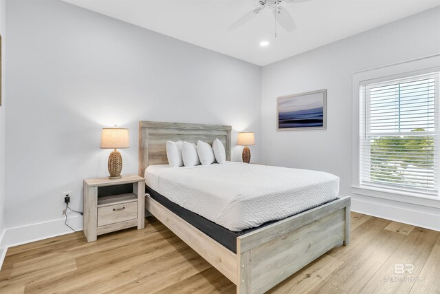 bedroom featuring light wood-style floors, recessed lighting, ceiling fan, and baseboards