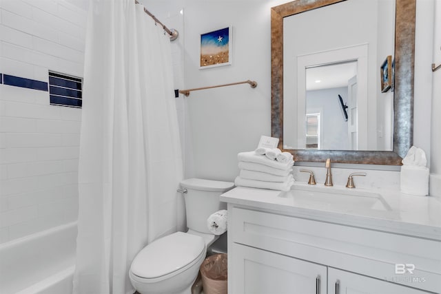 bathroom with shower / bath combination with curtain, vanity, and toilet
