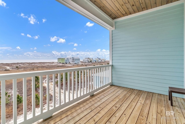 wooden terrace featuring a view of city