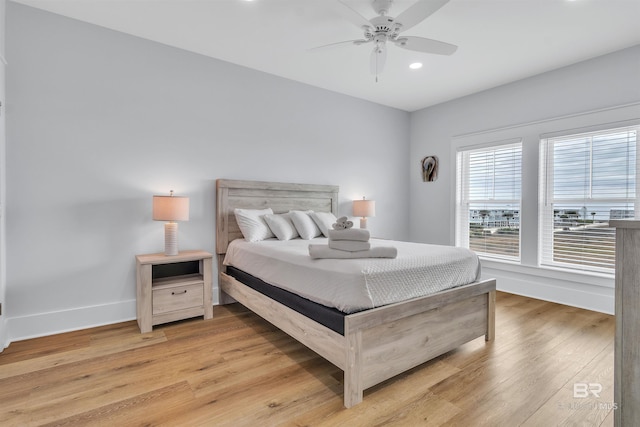 bedroom featuring light wood-style floors, recessed lighting, ceiling fan, and baseboards