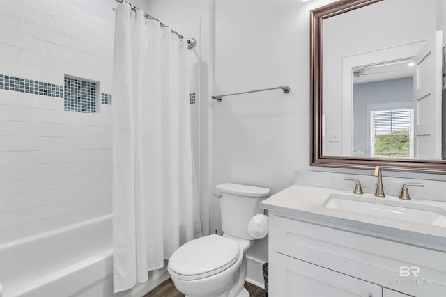 full bath with toilet, shower / tub combo with curtain, and vanity