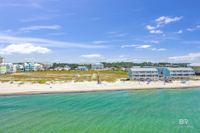 aerial view with a view of the beach and a water view