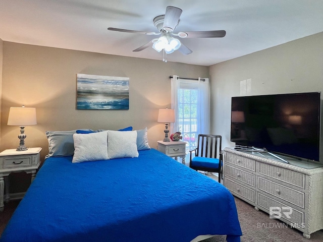 carpeted bedroom featuring ceiling fan