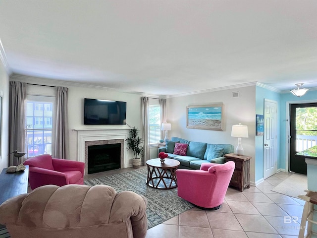 tiled living room with a premium fireplace and ornamental molding