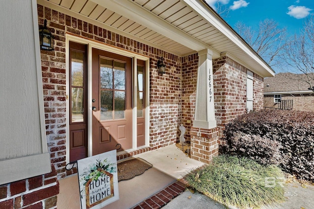 entrance to property featuring covered porch