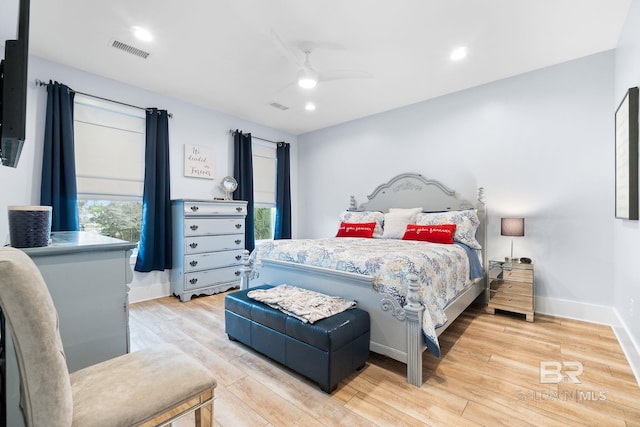 bedroom featuring ceiling fan and light wood-type flooring