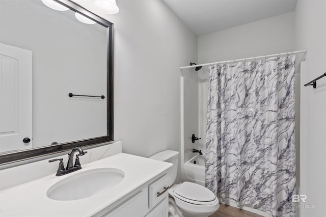 full bathroom with shower / bath combo with shower curtain, toilet, wood finished floors, and vanity