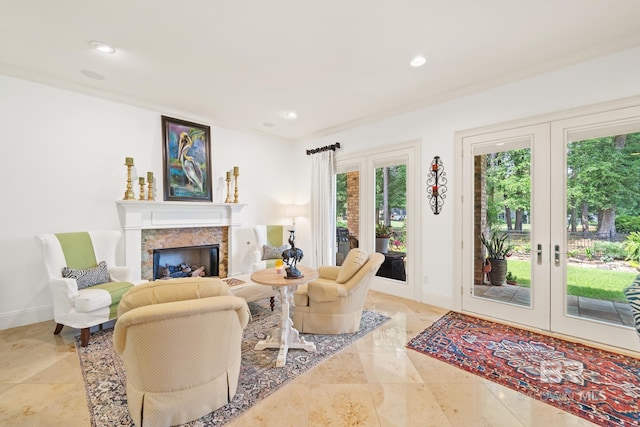 living room featuring tile flooring, french doors, crown molding, and a premium fireplace