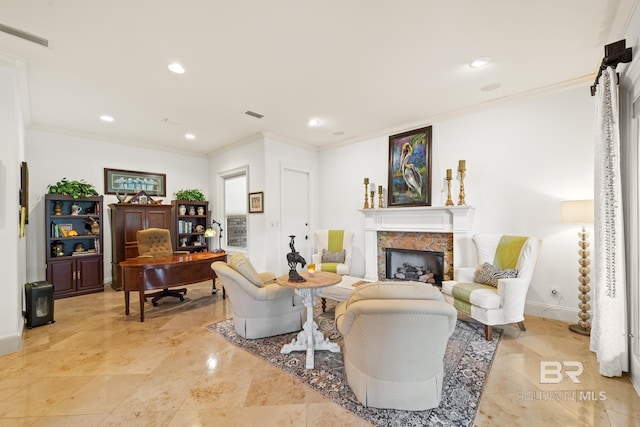 living room with ornamental molding, light tile floors, and a premium fireplace