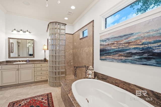 bathroom with tile flooring, oversized vanity, ornamental molding, and tiled bath