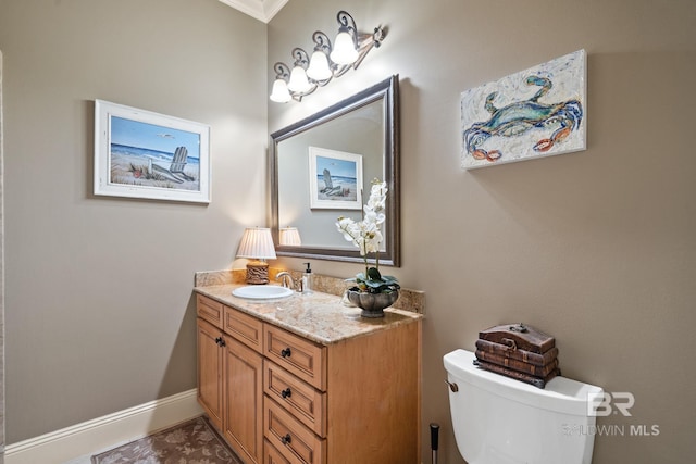 bathroom with oversized vanity and toilet