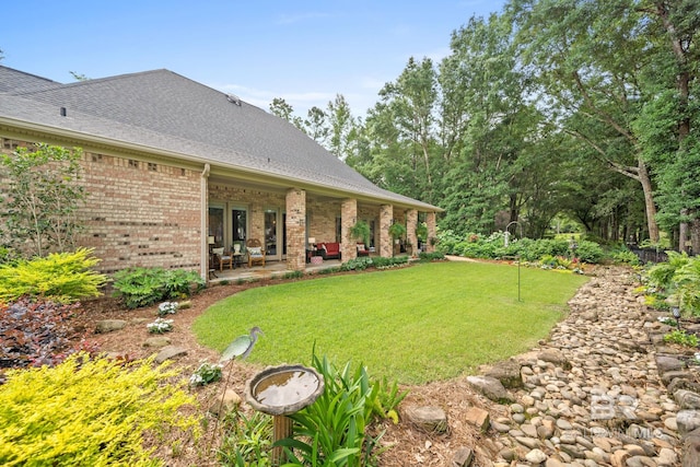 view of yard featuring a patio