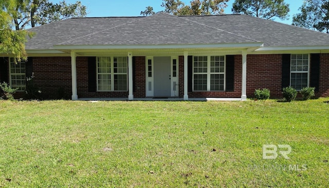 14313 Hemley Rd, Coden, AL 36523 - ranch-style home with a front lawn, a shingled roof, brick siding, and a porch
