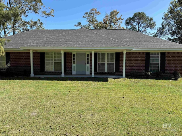 14313 Hemley Rd, Coden, AL 36523 - single story home with a front yard, brick siding, and a shingled roof