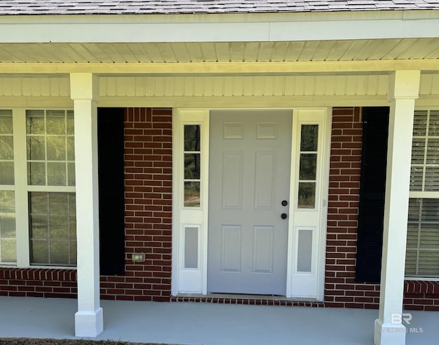 14313 Hemley Rd, Coden, AL 36523 - property entrance with brick siding and covered porch