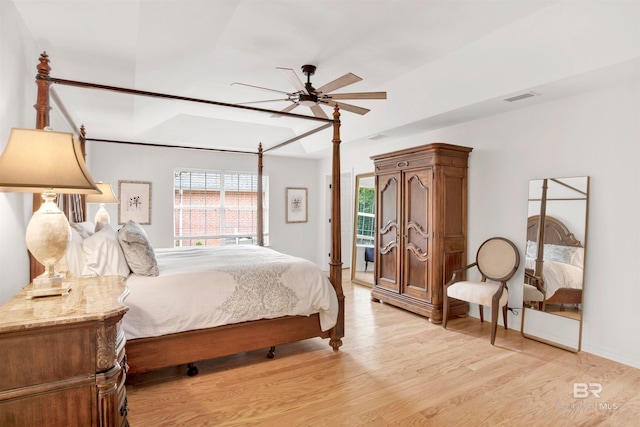 bedroom with ceiling fan and light wood-type flooring