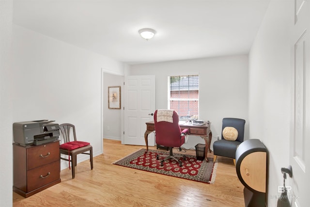 home office featuring light hardwood / wood-style flooring