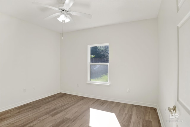 unfurnished room with ceiling fan and light wood-type flooring