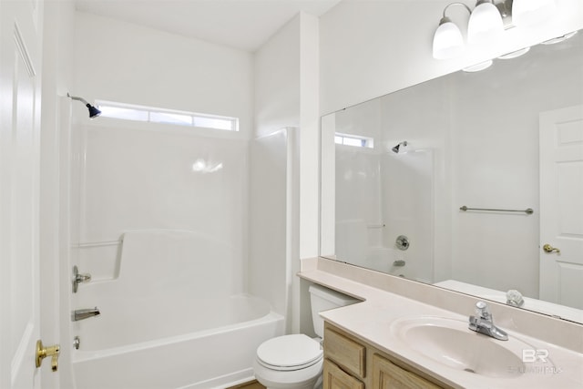 full bathroom featuring vanity,  shower combination, and toilet