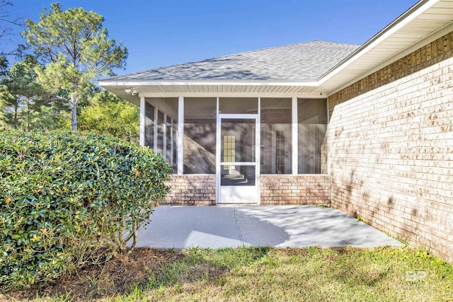 property entrance featuring a patio