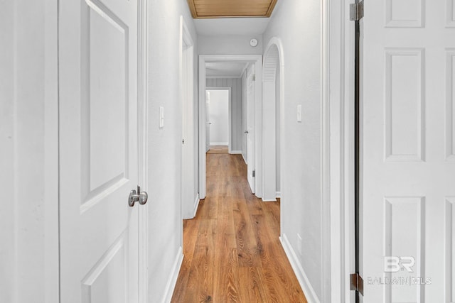 corridor featuring light hardwood / wood-style flooring