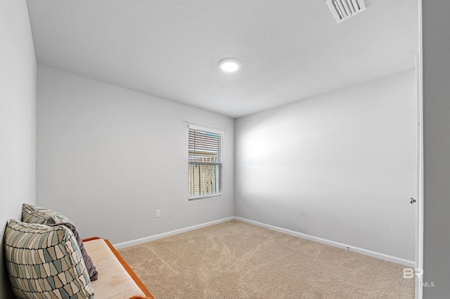 empty room with carpet flooring