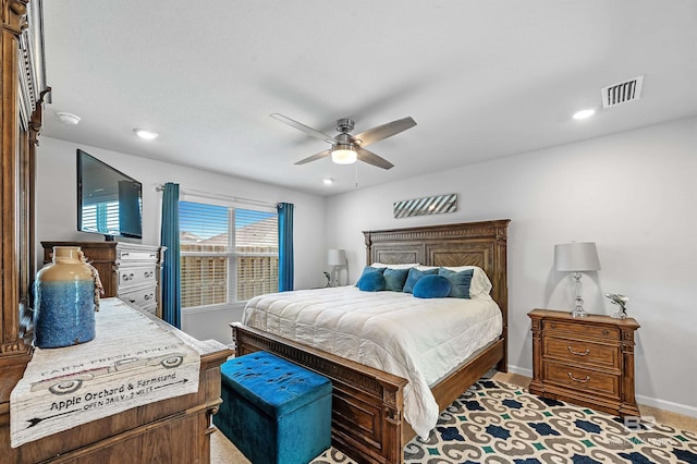 carpeted bedroom with ceiling fan