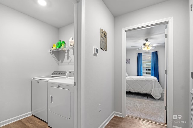 washroom featuring ceiling fan, carpet floors, and separate washer and dryer