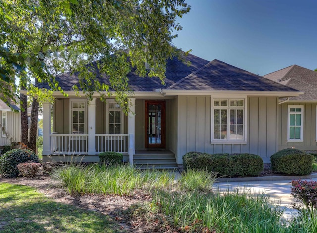 single story home featuring a porch