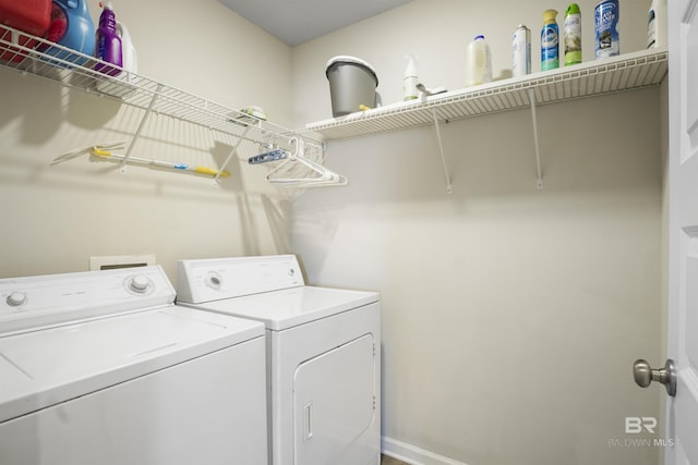 laundry room with washer and dryer and laundry area