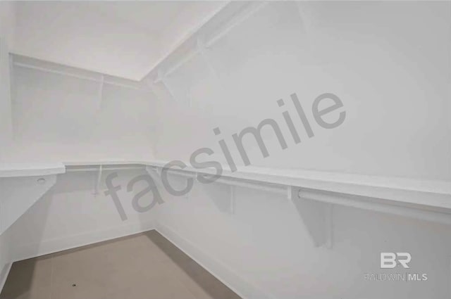 walk in closet featuring tile patterned floors