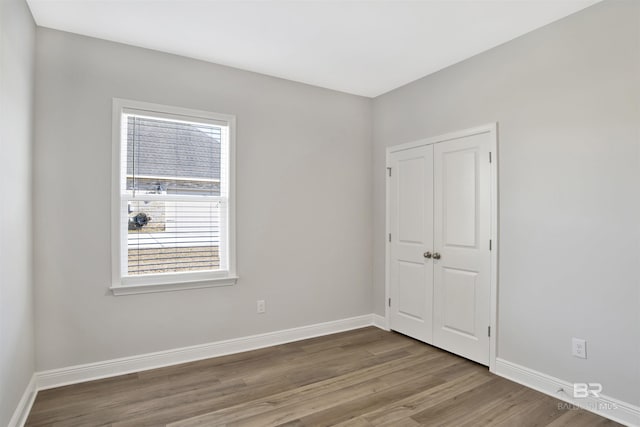 1061 Tampa Ave, Foley, AL 36535 - spare room with baseboards and wood finished floors