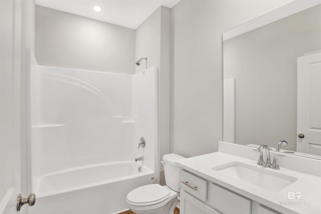 1061 Tampa Ave, Foley, AL 36535 - bathroom featuring toilet, bathtub / shower combination, and vanity