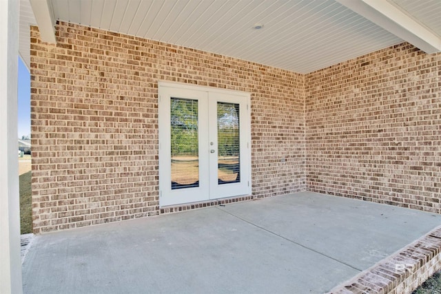 1061 Tampa Ave, Foley, AL 36535 - view of patio / terrace featuring french doors