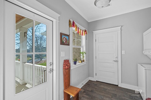 doorway to outside with baseboards, dark wood finished floors, and ornamental molding