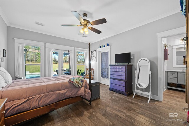 bedroom featuring baseboards, dark wood finished floors, ornamental molding, french doors, and access to outside