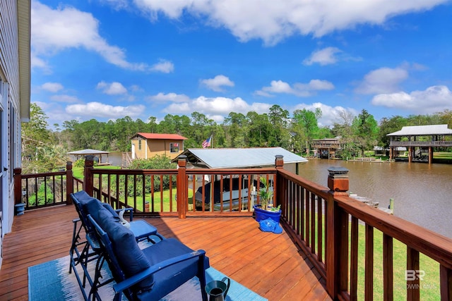wooden terrace with a water view
