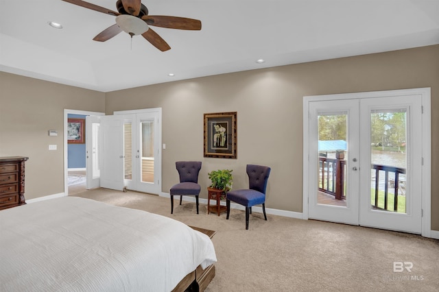 bedroom with access to outside, baseboards, light colored carpet, and french doors
