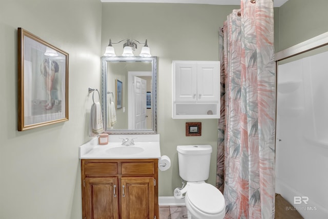 bathroom featuring vanity, baseboards, toilet, and a shower with curtain